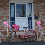Island Realty's Charming Pink Display of Support