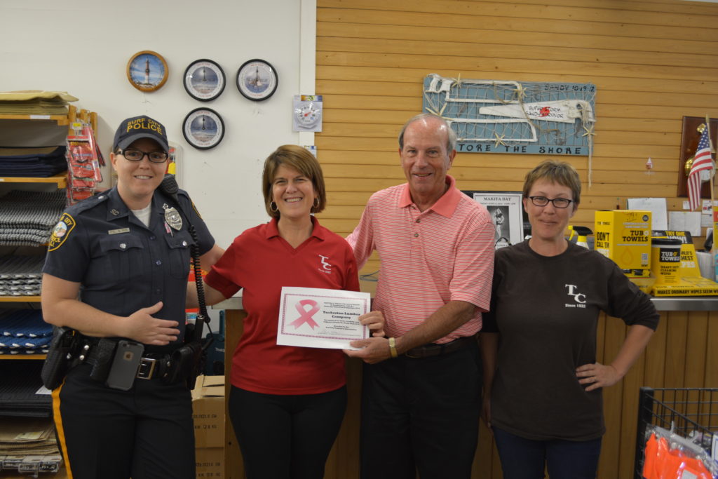 Tuckerton Lumber Company receives "The Pinkest Business in Surf City Award" for 2016, awarded by the Surf City Taxpayers Association. From left to right: "Surf Pink" Chairperson, Police Officer Sarah Roe; Tuckerton Lumber owner Liz Harrigle; SCTA incoming President Peter Williams and TLC’s own pink concept designer, Kerri Hamersma.